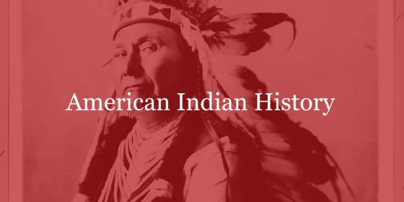 Native american wearing an head dress
