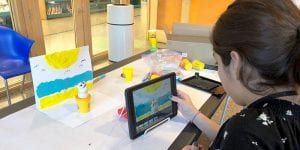 Teen making stop-motion videos