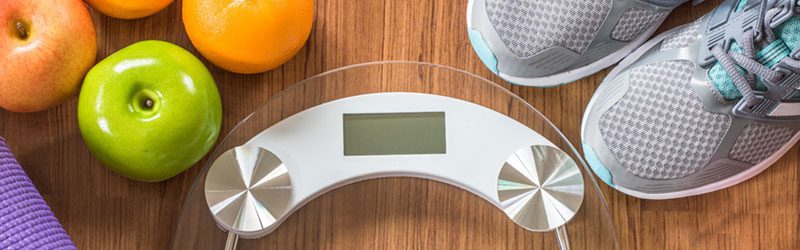 Scale, fruit, and workout equipment