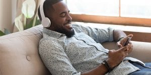 Person listening to music on phone