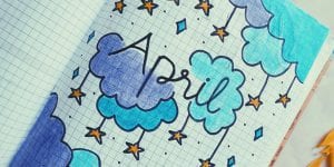 White, purple, and blue stars illustration with April in center
