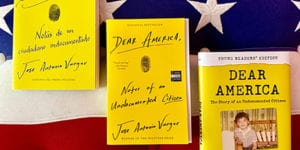 Three versions of Dear America (Spanish, English, Young Readers Edition) on American flag