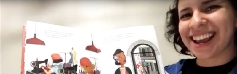 Miss Beronica reading a book