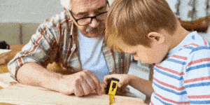 Grandparent and grandchild building, teen playing chess, adult and child learning sign language