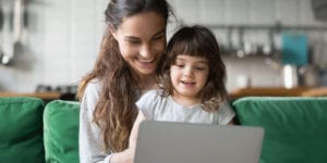 Parent and child with computer