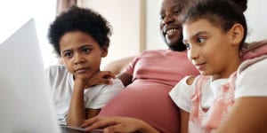 Family using laptop