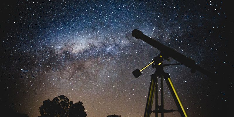 Telescope looking at the night sky