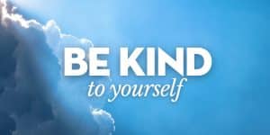 Be Kind to Yourself text floating on a blue sky with clouds