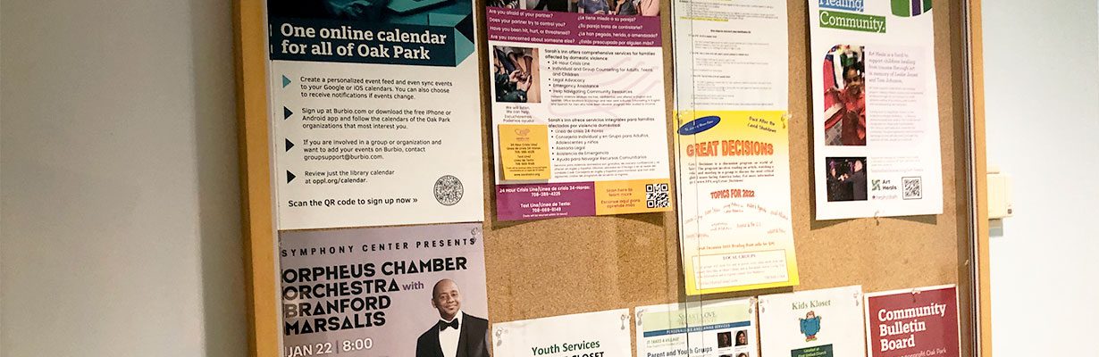 Flyers on the community bulletin board at the Main Library