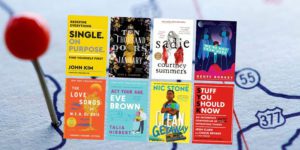 Book covers on a road map