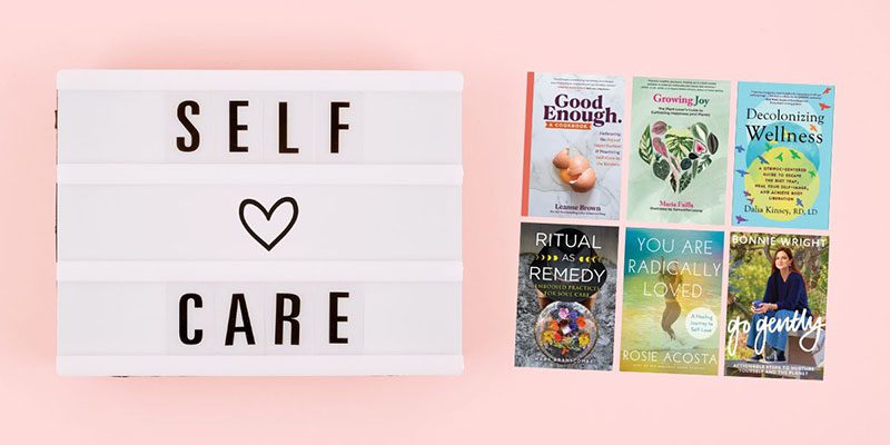 Self care with a heart icon displayed on a board, next to book covers of titles promoted on this page