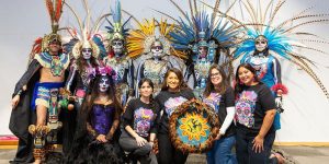 Front row, left to right: Jessy Martinez, Latine Language & Culture Librarian Nora Sanchez, Alma Martinez, Laura Pulido, and Maya Puentes. Back row: Omeyocan Dance Company