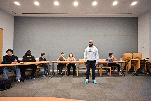 Chris Thomas of YourPassion1st facilitates the first meeting of the Access Granted Male Mentor Program at the library.