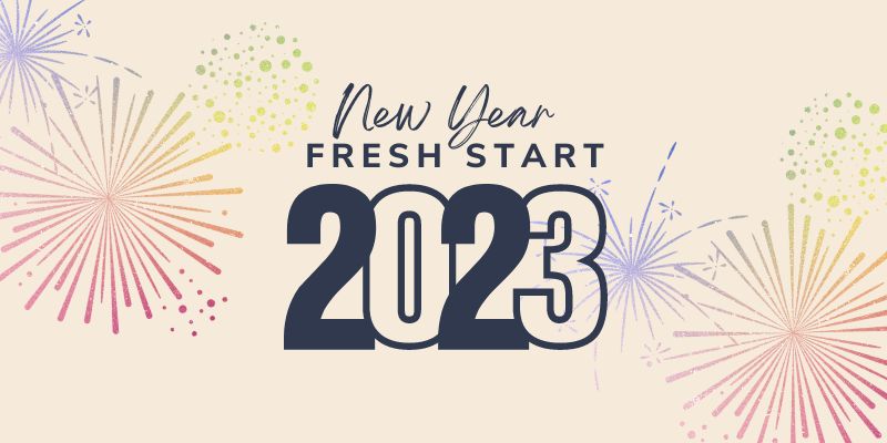 New Year: Fresh Start 2023 text with colorful firework background