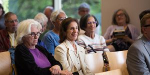 Older Adults attending an event in the Main Library Veterans Room