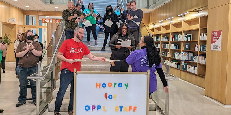 Library staff member receiving an award on Staff Day 2022