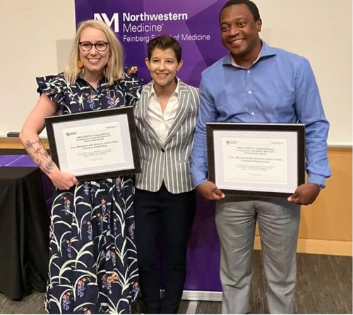 Ashley Knapp (left) and Robert Simmons (right) accept the ARCC Community-Academic Research Partnership Award at the Feinberg School of Medicine’s Annual Lewis Landsberg Research Day on September 14, 2023.