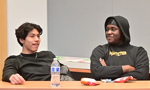 Two teens attend a library mentorship program