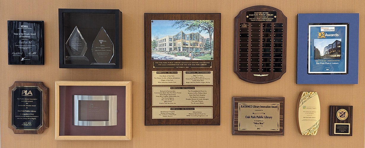 Wall of award plaques at Main Library