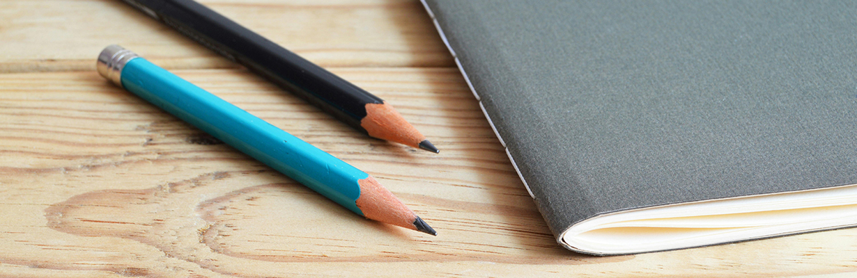 Test booklet and pencils sitting on a desk