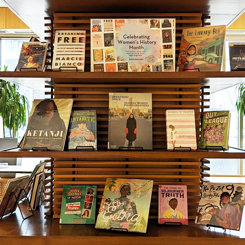 Display of books and DVDs for Women's History Month