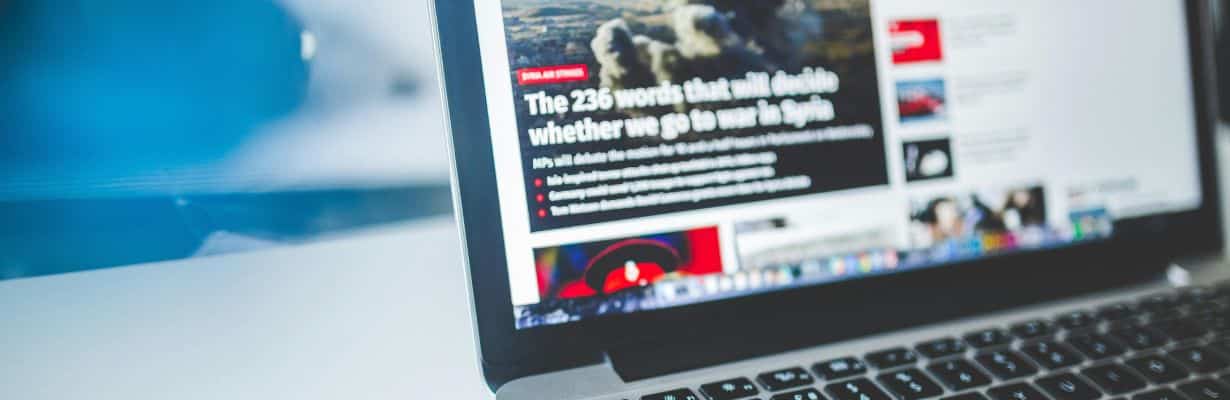 News website on laptop screen
