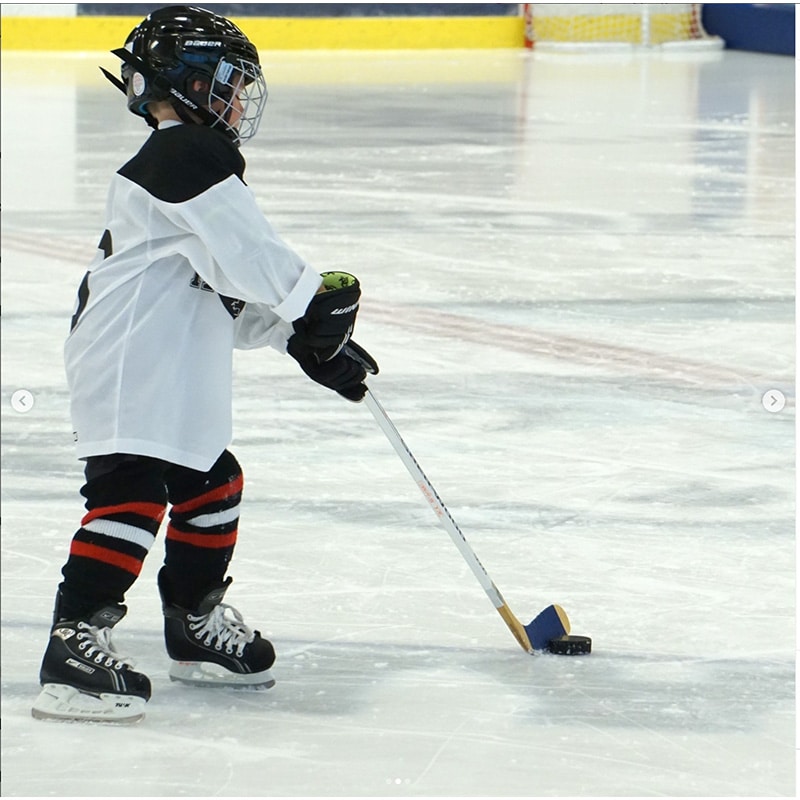 Hockey player on an ice skating rink