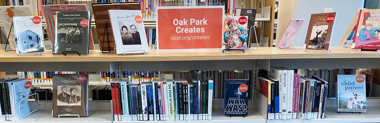 Books displayed on a shelf below a sign reading Oak Park Creates oppl.org/creates