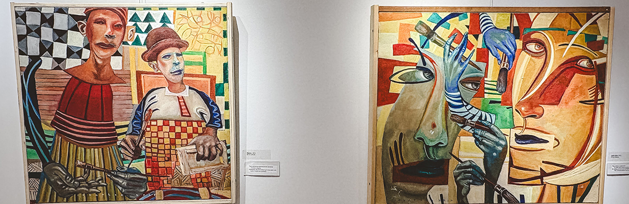 Two paintings by Jonathan Franklin in the Main Library Gallery.